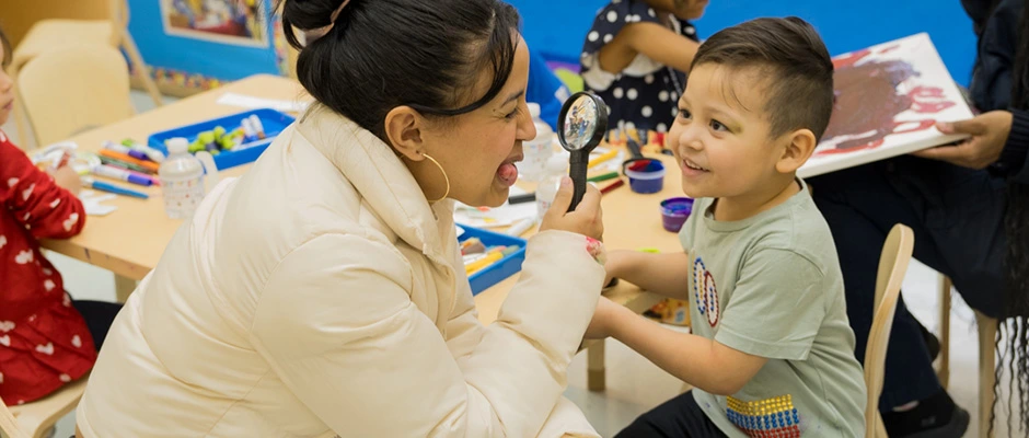 Parent with their child at the ECLC center.