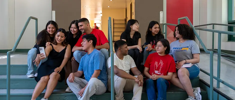 Students in the hallway posing for a picture